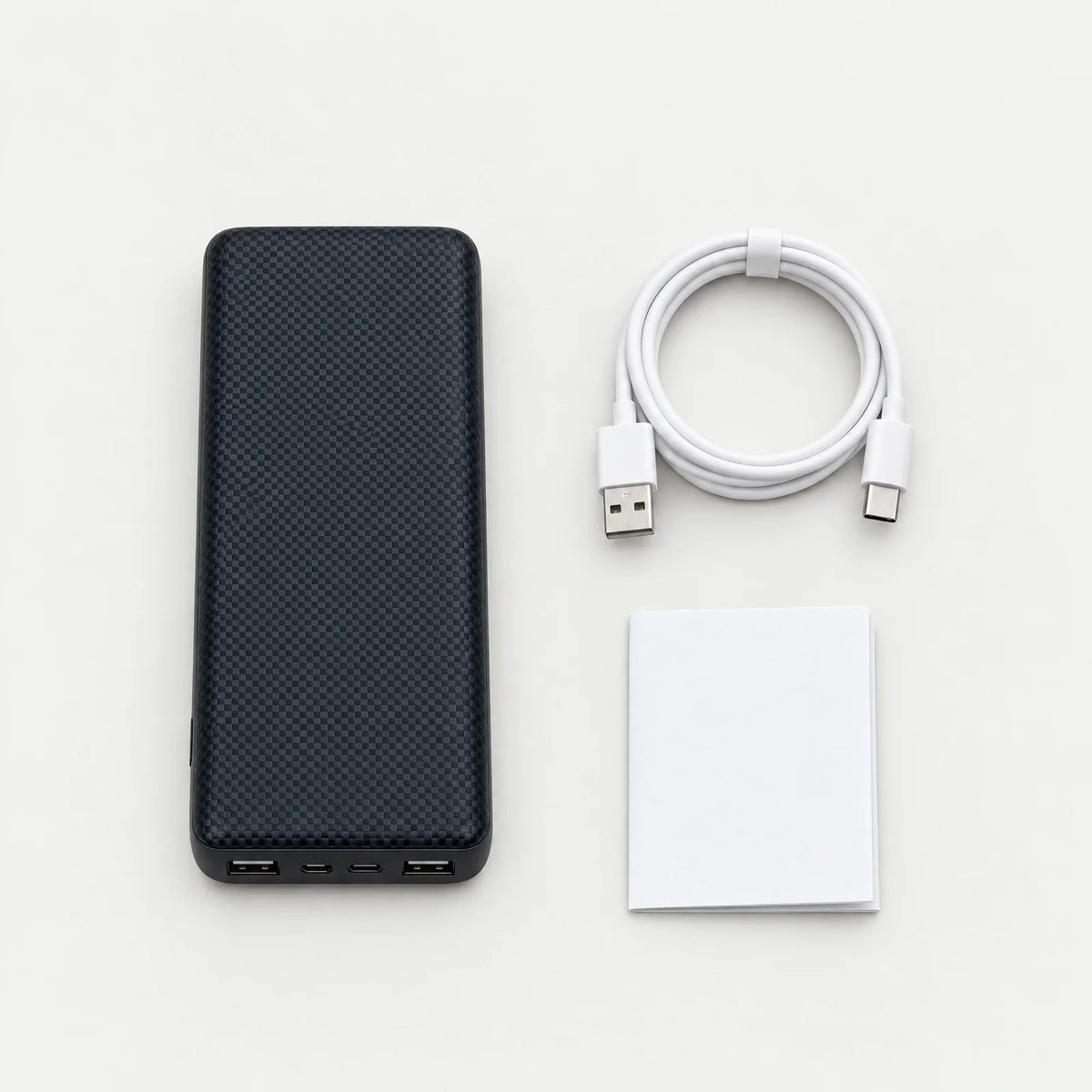 Inhoud: powerbank, USB-laadkabel en handleiding
